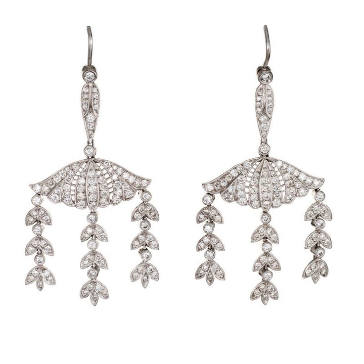 This is part of Chairish’s Fine Jewelry assortment.  Elegant pair of vintage diamond drop earrings crafted in 14k yellow gold and platinum.   Round brilliant cut diamonds total an estimated 2.25 carats (estimated at H-I colour and VS2-SI1 clarity).    The charming earrings are set with diamonds in intricate three tier foliate style drops. Ideal for day or evening wear. The earrings are fitted with post & lever backings for pierced ears.  The earrings are in excellent condition and were recently Rose Gold Dangle Earrings, Yellow Diamond Earring, Emerald Diamond Earrings, Diamond Dangle Earrings, Earring Crafts, Pearl Earrings Dangle, Diamond Drops, Gold Earrings Dangle, Earrings Vintage