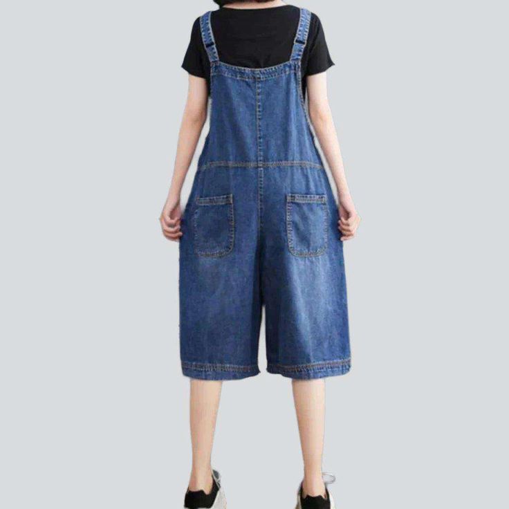 Introducing the 2023 Summer Collection ââ‚?denim romper with uneven buttons. 90s style! This established piece of punkish vogue is perfect for the trendsetter who loves to make a statement and stand out from the crowd.Why They're Your Next Summer StapleThese denim-inspired shorts are the perfect blend of contemporary vogue and nostalgic 90s underground. With a unique asymmetric button and zipper closure. they flaunt a damaged pattern that adds a hint of edginess to any look. Crafted with premium Summer Relaxed Fit Bib Front Shortalls, Casual Summer Shortalls, Casual Bib Front Shortalls For Summer, Trendy Summer Bib Front Shortalls, Summer Bib Front Shortalls With Pockets, Trendy Summer Shortalls With Bib Front, Casual Summer Shortalls With Pockets, Casual Summer Shortalls Overall, Spring Denim Shortalls With Bib Front