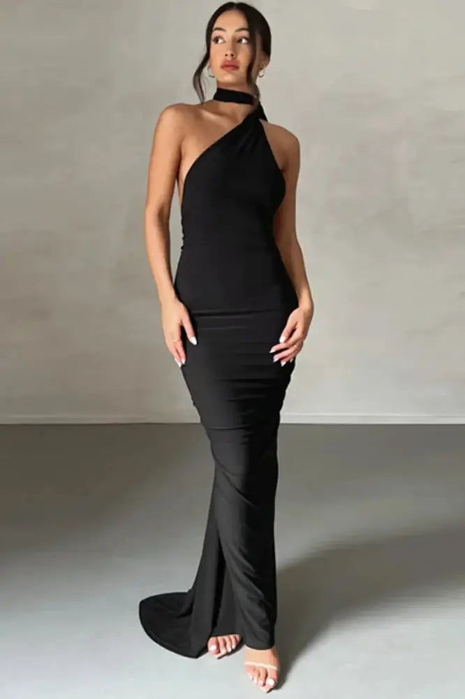 Introducing our Oblique Shoulder Backless Maxi Dress, a perfect blend of elegance and summer flair. This gown features a unique oblique shoulder design with a back strap, adding a stylish twist. The sleeveless cut and ruched detailing offer a flattering silhouette, making it ideal for summer events or special occasions. Elevate your summer wardrobe with this chic and sophisticated dress. Details: Neckline: Strapless Decoration: Backless Material: POLYESTER Material: SPANDEX Closure Type: Pullove Fitted One Shoulder Backless Dress For Date Night, Fitted One-shoulder Backless Cocktail Dress, Asymmetrical One Shoulder Summer Prom Dress, Fitted One Shoulder Backless Cocktail Dress, Fitted One-shoulder Backless Dress For Party, Formal Stretch One Shoulder Dress, Summer Formal Stretch Backless Dress, Stretch One Shoulder Formal Dress, Stretch Backless Dress For Formal Summer Events