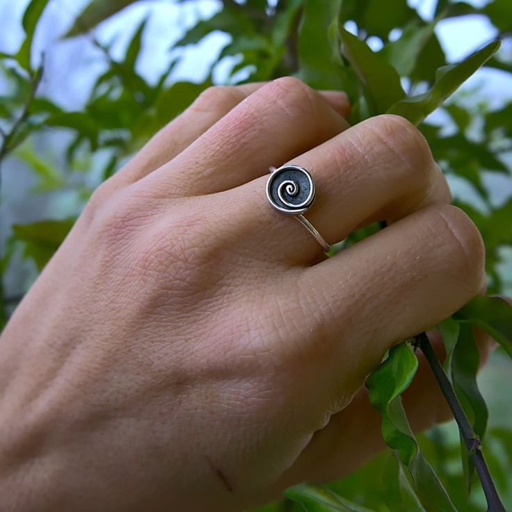 The mini Spiral ring is delicate and minimalist, perfect for everyday wear.Spirals represent the journey and change of life as it unfolds. They are a powerful symbol that have been used in ancient cultures around the world since prehistory in order to represent the path of universal growth and evolution, eternity and continuity.Wearing spiral jewelry brings the presence of this prehistoric symbol into daily life, inviting oneself to explore the infinity of the mind, the vastness of creation, and Minimalistic Rings, Change Of Life, Hand Forged Jewelry, Growth And Evolution, Spiral Jewelry, Dainty Band, Wearing Jewelry, Cultures Around The World, Spiral Ring