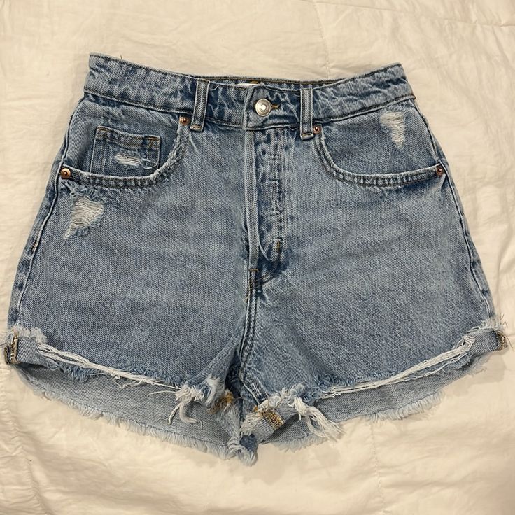 Women’s Denim Shorts From H&M Size: 2 Color: Washed Blue Denim; Distressed Brand: H&M Button Fly. 5 Pockets. Short, Raw Edge. High-Waisted. Never Worn. H&m Denim Blue Straight Leg Bottoms, H&m Straight Leg Denim Blue Bottoms, H&m High Waist Denim Blue Jeans, Trendy H&m Bottoms For Day Out, H&m Denim Blue Bottoms With Pockets, H&m High Rise Denim Bottoms, H&m High Waisted Casual Jean Shorts, H&m Light Wash Mid-rise Bottoms, H&m High Waist Dark Wash Bottoms