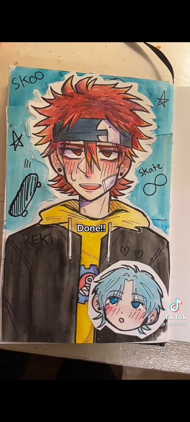 a drawing of a boy with red hair and blue eyes is on the wall next to a sign