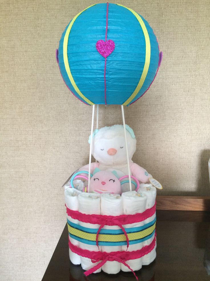 a baby's diaper cake in the shape of a hot air ballon