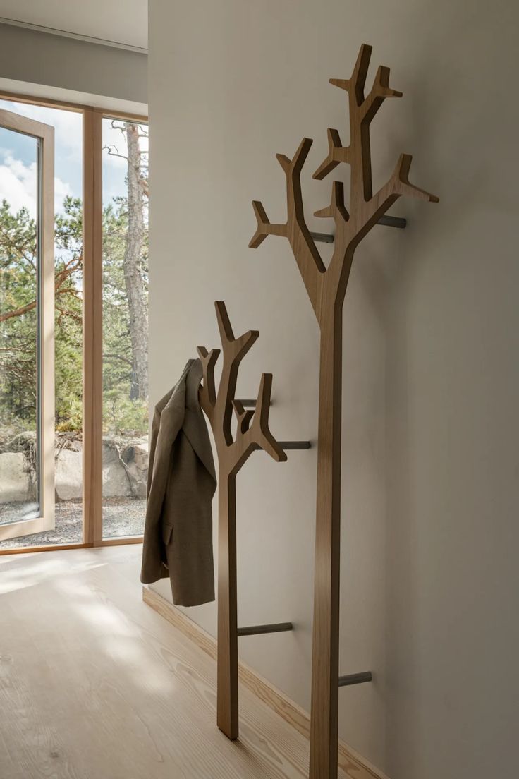 the coat rack is made out of wood