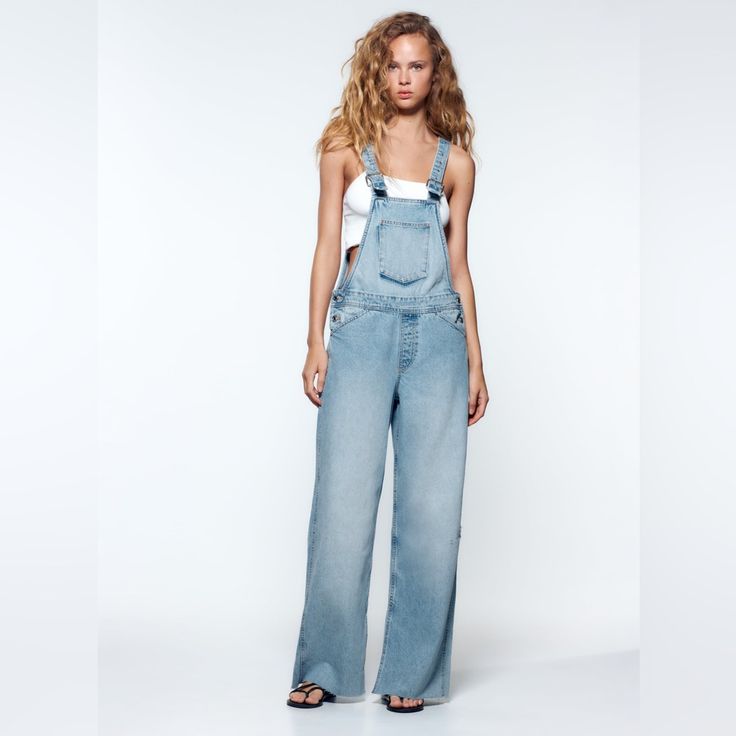 Zara Denim Split End Romper Zara Knit Overalls, Zara Light Wash Straight Leg Jeans, Full-length Denim Blue Jumpsuit For Spring, Spring Full Length Denim Jumpsuit, Zara High Waist Light Wash Jeans, Dark Wash Full-length Denim Jumpsuit, Chic Medium Wash Cotton Overalls, Medium Wash Full-length Denim Jumpsuit For Spring, Medium Wash Full Length Denim Jumpsuit For Spring