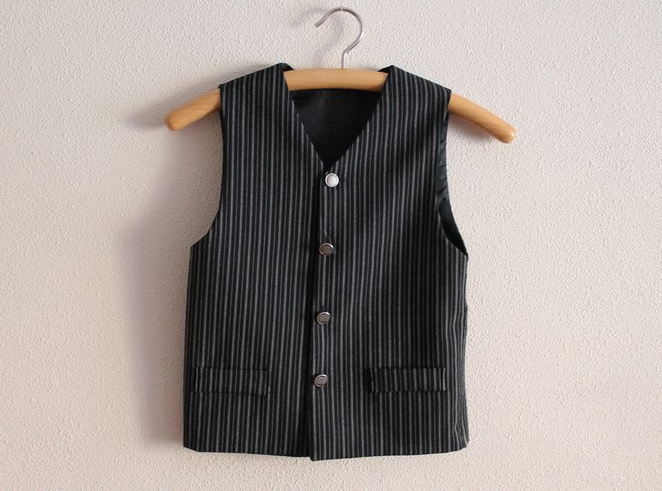 "Boys Vest Black Vest Black Striped Boys Vest Kid's Formal Fitted Childrens Waistcoat Edwardian Victorian Renaissance Steampunk Baroque Measurements (lying flat): Length(back): 19.5\"/ 49.5 cm Chest: 15\"/ 38 cm Condition: great Vintage Condition Please check measurements to insure a proper fit. Remember to allow yourself some extra room for movement. You can compare these with something from your closet that fits you well. SHIPPING * I ship worldwide via Priority mail * I ship from Europe, so p Victorian Jacket, Kids Formal, Boys Vest, Striped Vests, Black Vest, Addams Family, Vest Outfits, Extra Room, Black Stripes