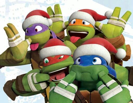 the teenage mutant ninjas are wearing christmas hats and holding their hands in the air