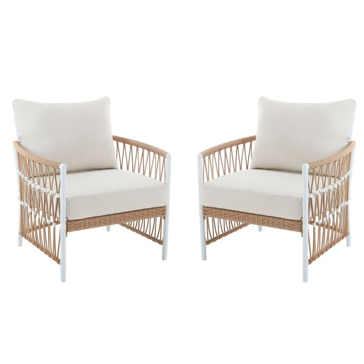 two white wicker chairs sitting next to each other on top of a white floor