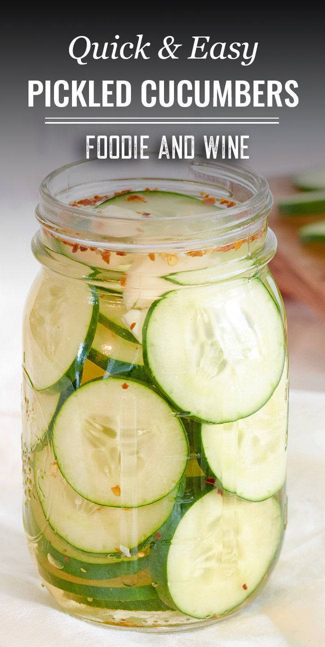 pickled cucumbers in a mason jar with text overlay reading quick and easy pickled cucumbers foodie and wine