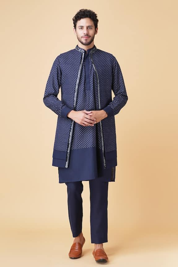 Blue longline bundi jacket with nalki embroidery on the collar and placket. Paired with a matching blue full cuffed sleeve kurta and pant. - Aza Fashions Cotton Long Sleeve Outerwear For Eid, Long Sleeve Cotton Outerwear For Eid, Designer Cotton Bandhgala With Long Sleeves, Cotton Nehru Jacket With Dabka And Long Sleeves, Long Sleeve Cotton Nehru Jacket With Dabka, Long Sleeve Cotton Nehru Jacket With Dabka Detailing, Designer Long Sleeve Kurta With Embroidered Cuffs, Indigo Long Sleeve Sets For Designer Wear, Jayanti Reddy