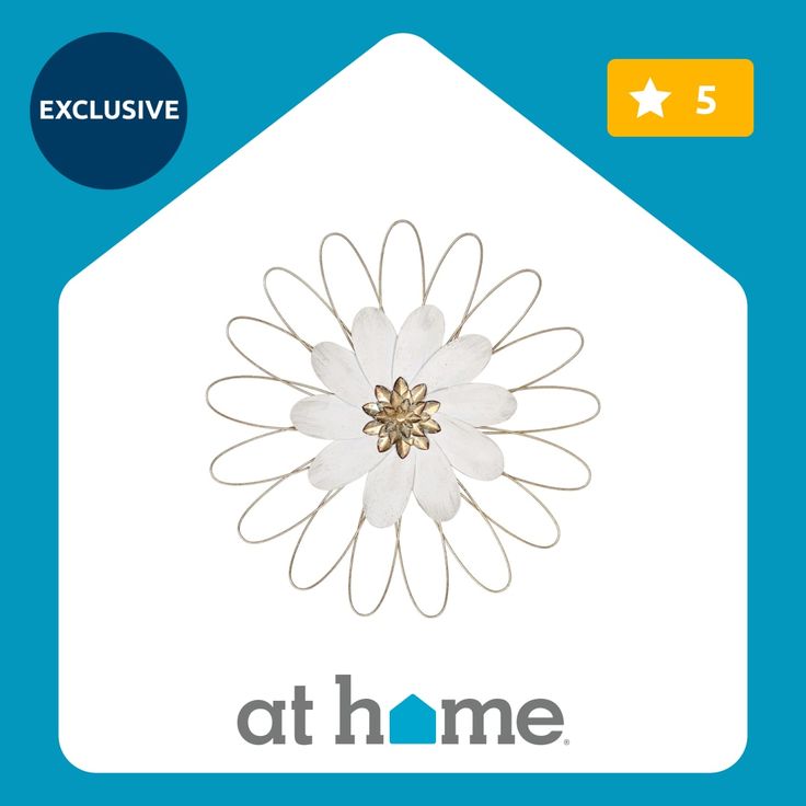 a white flower with the words at home on it's front and bottom corner