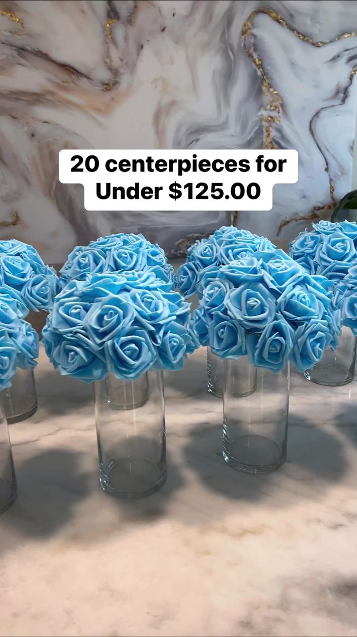 blue roses are in vases on a table for $ 1 / 2 50 each