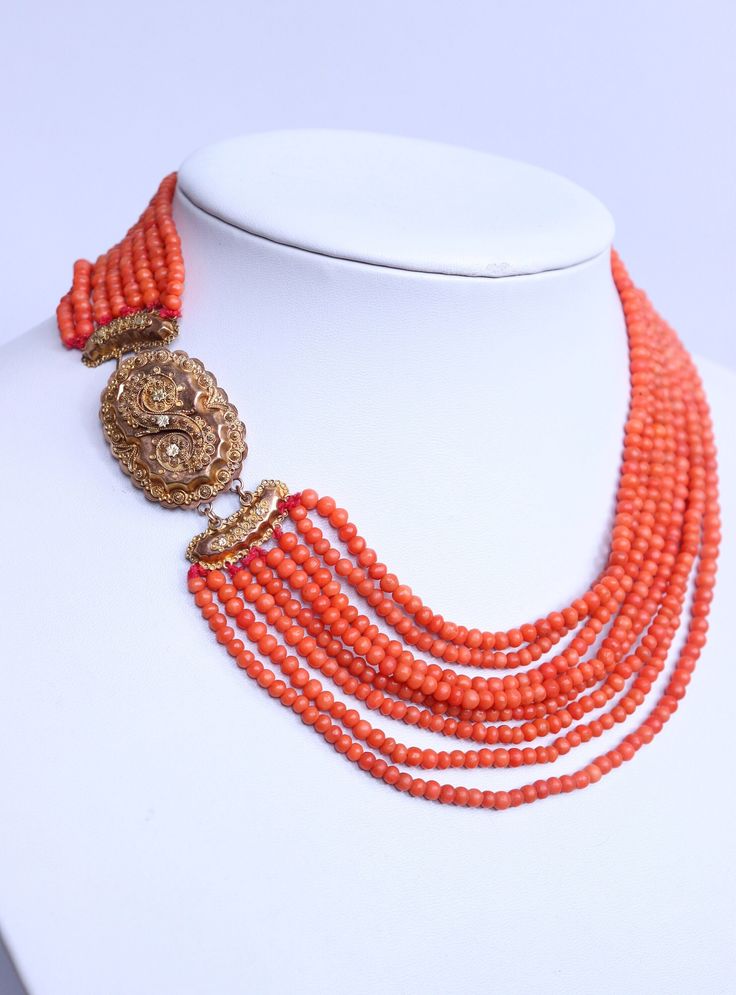 72gr Vintage Natural Coral Necklace Undyed Beads Dutch Gold Clasp 14k This is nice vintage necklace from natural coral, not dyed beads. The necklace was made in Netherlands. 8 coral strands round shape finished by a beautiful filigree large clasp made from yellow gold 14k. Classic style. Looks gorgeous! Size of beads: 3-4mm  Clasp length: 5cm /2in (with bows) Coral strand's length - 34-41cm (13,6-16,4in) +5cm clasp Clasp - yellow gold 585 (tested by acid) Weight: 72 grams Age of corals: vintage Condition: please see condition on photo! Good vintage condition. The necklace was restringed.  If you need more photos, write and me I'll send you. Our Viber, What's App, Telegram:  +3-8-093-91-478-91 Please visit my other listings! I have many beautiful coral jewelry listed on etsy. I ship worldwi Coral Choker Necklace, Elegant Multi-strand Red Coral Jewelry, Coral Multi-strand Beads For Jewelry Making, Traditional Single Strand Coral Jewelry, Vintage Red Coral Jewelry For Formal Occasions, Vintage Red Coral Jewelry For Formal Events, Vintage Formal Red Coral Jewelry, Formal Vintage Red Coral Jewelry, Elegant Multi-strand Red Coral Beaded Necklaces