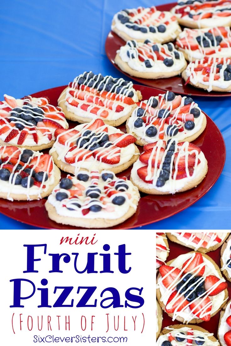 mini fruit pizzas with red, white and blue icing are on a plate