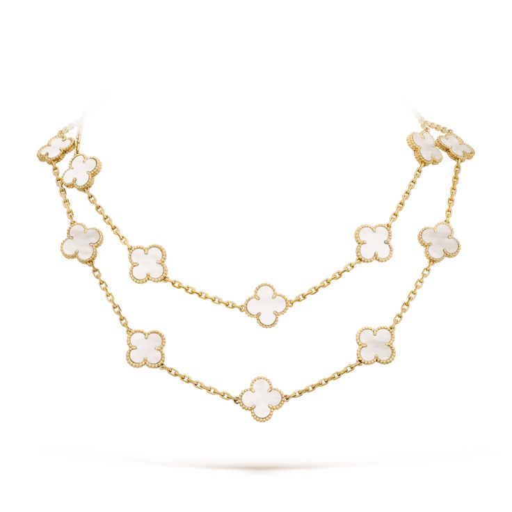 Indulge in luxury with our Clover 20 Motifs White Mop Gold Necklace. Each jewelry piece features 20 unique motifs, crafted with white mother of pearl and accented with gold. Elegant and exclusive, this necklace is the perfect accessory for any sophisticated and tasteful wardrobe. ADDITIONAL INFORMATION Color: Gold Stone: White Mop Ref. vcarp34802 Material:- 925 Sterling Silver - 18k Gold Plated- 18k Real Gold ( contact us via instagram) Length of chain : 84cm Our replica products are committed t Alhambra Van Cleef, Van Cleef And Arpels Jewelry, Van Cleef & Arpels, Van Cleef And Arpels, Classic Bracelets, Clover Necklace, Diamond Charm, Modern Necklaces, Van Cleef Arpels