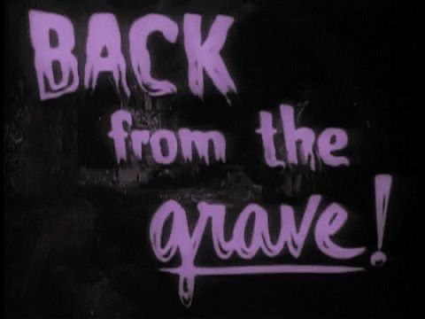 the back from the grave sign has been spray painted with white paint and purple ink