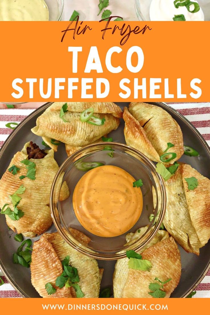 an image of taco stuffed shells on a plate with dipping sauce in the middle