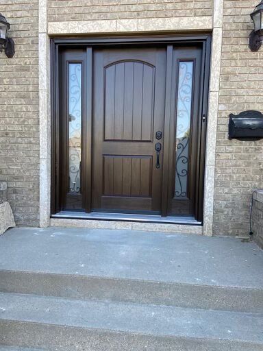 a front door with steps leading up to it