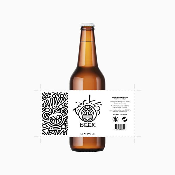 a brown beer bottle with a white label on the front and side, next to a black and white pattern