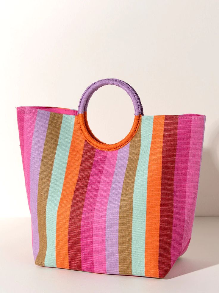 This Multi Massima Tote pairs perfectly with our little zip pouch, pack up your basics in this tote bag, grab and go! Color: Multi L 20" × W 7.5" × H 16"; Hnd 6" Material: Paper Double Handles Magnetic Snap Closure 1 Inner Slip Pocket Vegan Colorful Tote Bags, Kids Purse, Striped Bags, Childrens Backpacks, Pack Up, Straw Tote, Monogram Styles, Monogram Gifts, Zip Pouch