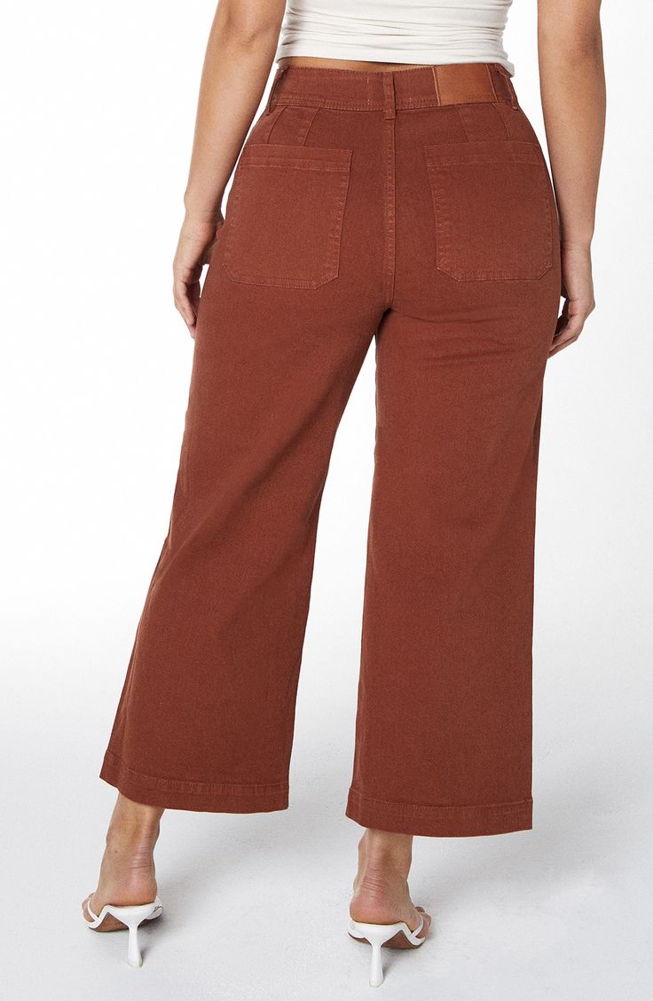 A high-rise silhouette that fits close through the waist and hips brings the best of both baggy and fitted aesthetics in these cropped jeans designed with a hint of stretch. 25 1/2" inseam; 22" leg opening; 11 3/4" front rise; 12" back rise Zip fly with button closure Front on-seam welt pockets; back patch pockets 98% cotton, 2% spandex Machine wash, line dry Imported High Rise Cropped Jeans With Belt Loops For Fall, High Waist Cotton Cropped Jeans For Work, High Waist Cotton Cropped Jeans, Cropped Cotton Bottoms With Pockets, Fall High Rise Cropped Jeans, High Waist Cropped Jeans For Work, Cropped Cotton Pants With Pockets, Cropped Jeans For Workwear, Cotton Cropped Leg Flare Jeans With Belt Loops