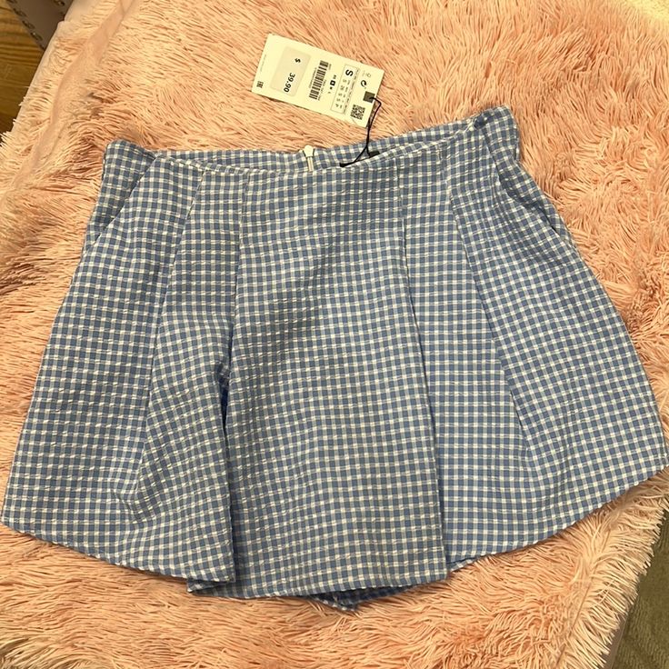 These Skorts Have Pockets. Cute Cotton Summer Skort, Cute Cotton Skort For Summer, Cute Cotton Skort For Spring, Plaid Cotton Shorts For Day Out, Cute Light Blue Bottoms For Summer, Trendy Plaid Cotton Skort, Cute Light Blue Summer Bottoms, Summer Gingham Bottoms With Pockets, Gingham Bottoms With Pockets For Summer