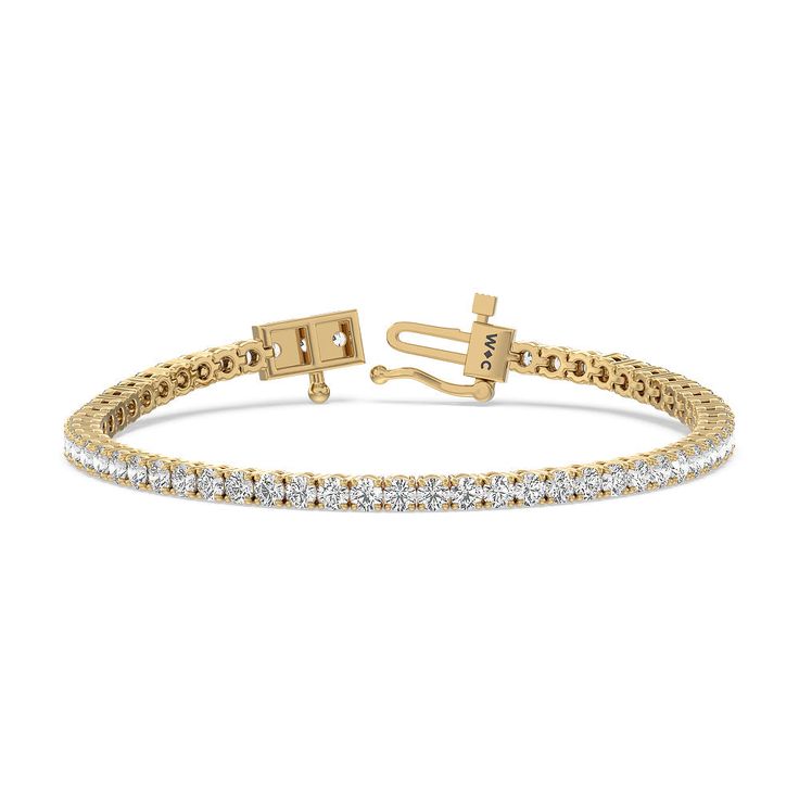 This classic tennis bracelet features a single row of sparkling brilliant cut diamonds Set in gold four-prong baskets with a total diamond weight of 2Cts