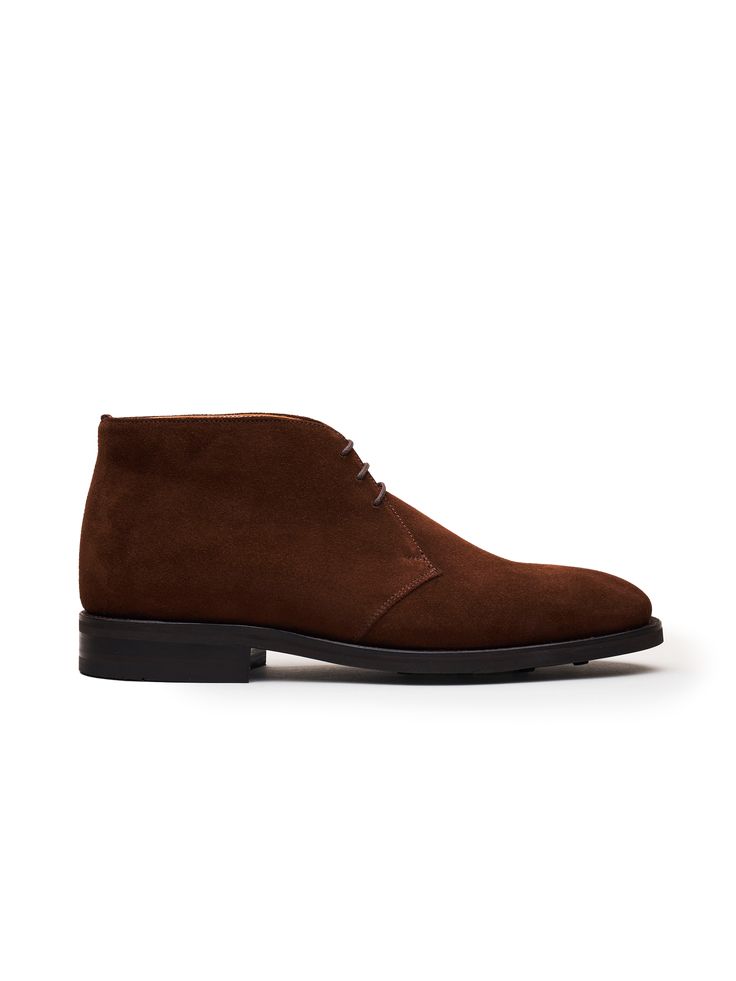 The Chukka Boot was initially designed for rough weather and terrain for the army. Our take shares many of those good qualities. A full leather lining makes these shoes perfect for the whole fall season, and if you happen to be in a bit warmer climate, an ideal year-rounder. Our interpretation of the iconic silhouette, featuring a classic ankle-cut, gives a confident and unique look that will be a sound addition to your everyday lineup. At the same time, the sturdy rubber sole makes the chukkas Masculine Leather Sole Work Boots For Fall, Masculine Leather-sole Work Boots For Fall, Fall Moc Toe Desert Boots With Vibram Sole, Fall Desert Boots With Vibram Sole And Moc Toe, Plain Toe Chukka Boots With Goodyear Welt For Winter, Winter Chukka Boots With Goodyear Welt And Plain Toe, Winter Plain Toe Chukka Boots With Goodyear Welt, Brown Rugged Chukka Boots For Winter, Rugged Chukka Boots For Business In Fall