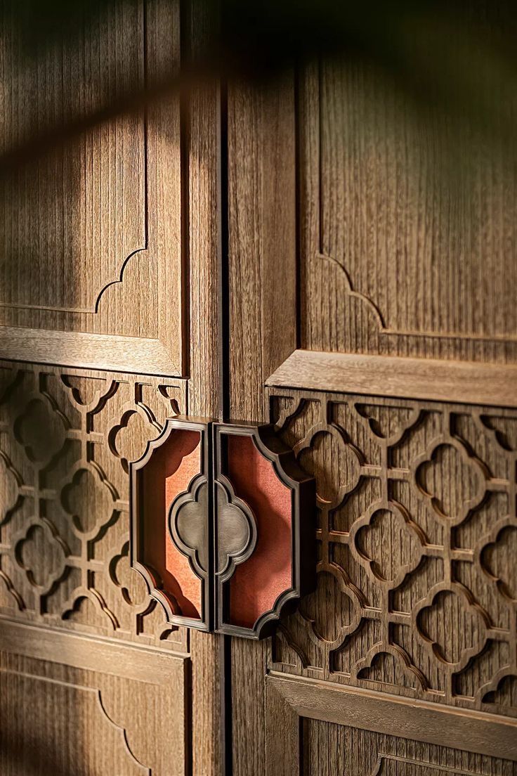 a wooden door with intricate carvings on it