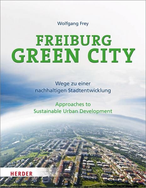 a book cover with an aerial view of a city and the words, freeburg green city