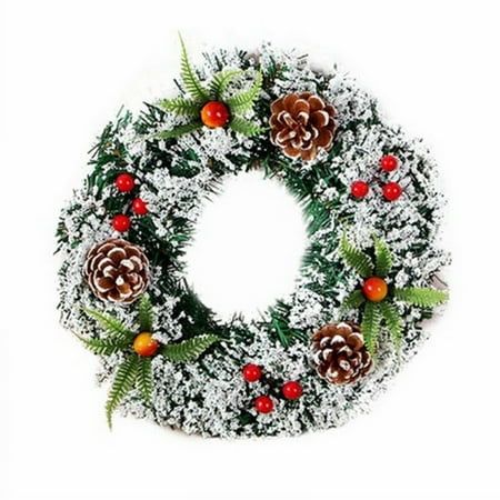 a christmas wreath with pine cones and berries