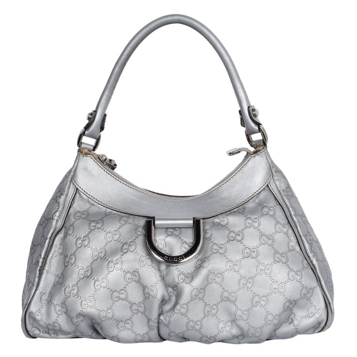 Authentic, pre-owned Gucci Abbey D Ring Shoulder Bag in Silver. Features silver large GG logo print with embossed leather, silver hardware, D-ring front logo, zipper top closure, off-white textile interior lining with zipper slip pocket and patch pocket, rolled leather handle strap. Add your wallet, keys, phone, cosmetic bag, and more. You're going to love this Gucci! Authenticity code: 190525 491403 Made in Italy Strap Drop: 7" Classic Shoulder Bag With Silver-tone Logo Plaque, Designer Bags With Silver-tone Logo Plaque For Formal Events, Modern Silver Shoulder Bag With Logo Hardware, Formal Gucci Shoulder Bag With Zipper Closure, Formal Silver Gucci Shoulder Bag, Formal Silver Bags With Logo Hardware, Luxury Silver Bag With Logo Hardware, Formal Silver Shoulder Bag With Logo Hardware, Silver Leather Bags With Logo Hardware