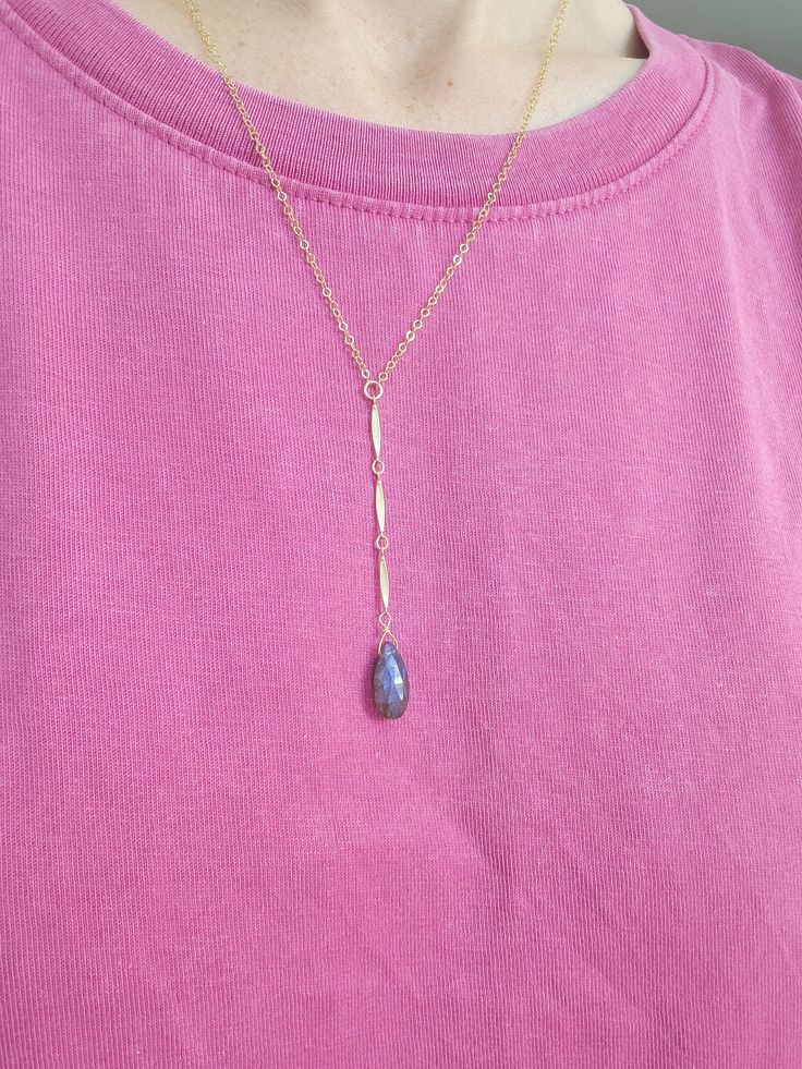 Beautiful Labradorite Waterfall Necklace. Always a gorgeous and magical gemstone! Wear this with a V neck or over a t-shirt for a more casual look. The length of the drop from the little center circle down to the bottom of the stone is just over 2 1/2 in. The chain on the drop is a beautiful bar chain. Each Labradorite is unique and will slightly vary as they are natural. Some will have more of a blue color and others may be more green, yellowish-green, purple-blue, and silverish. If you have a Waterfall Necklace, Yellowish Green, Beautiful Bars, Labradorite, Gold Filled, Casual Looks, Blue And Purple, Blue Color, V Neck