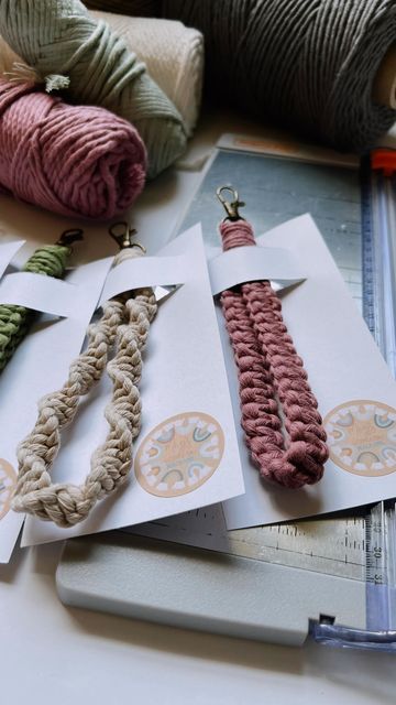 some knitting supplies are laying out on a table