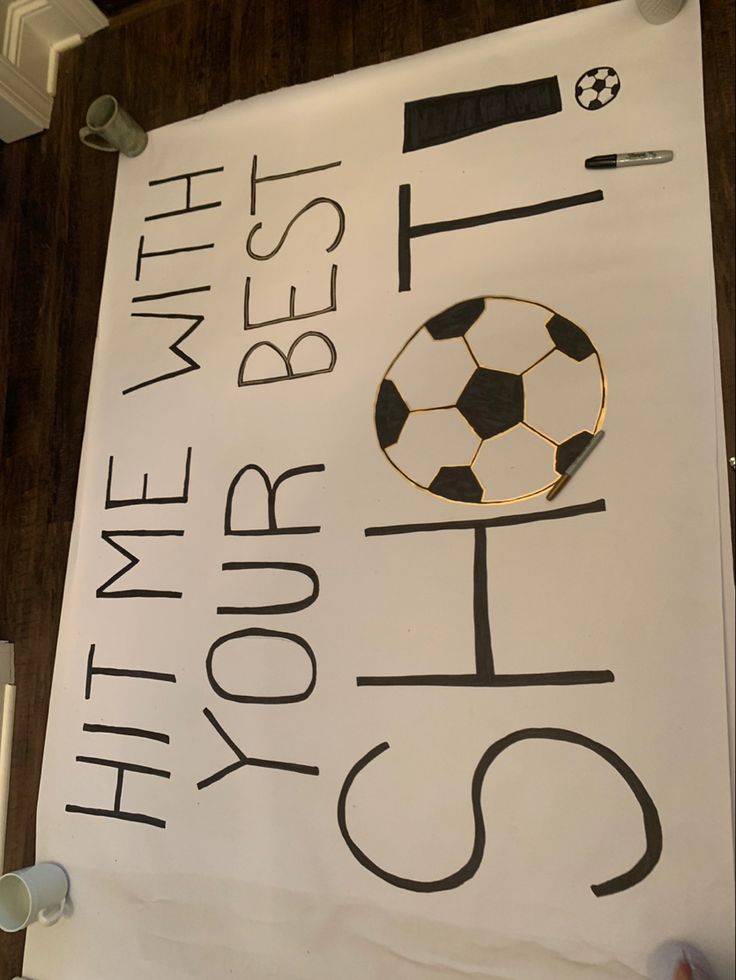 a white sign with black writing and a soccer ball on it that says, best time for you