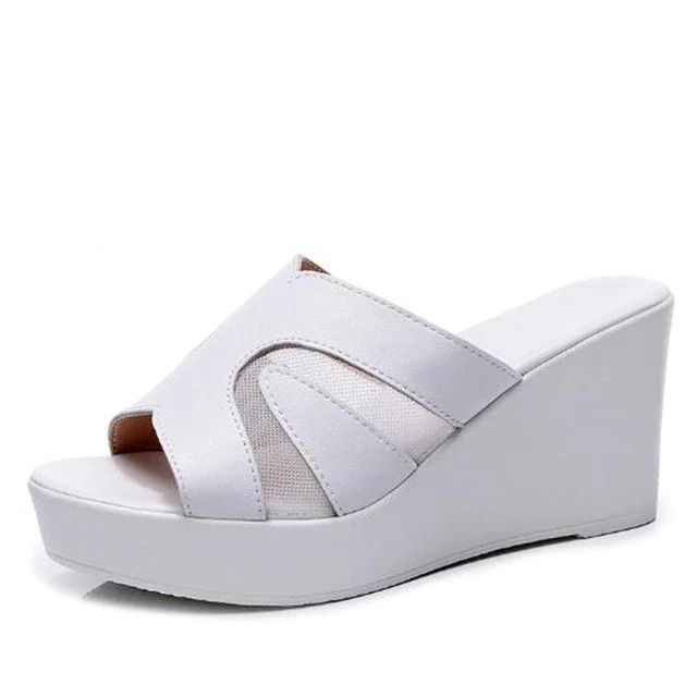 • Upper Material: Split Leather• Season: Summer, Spring, Autumn• Pattern Type: Solid• Outsole Material: TPU• Lining Material: Polyurethane• Item Type: Slippers• Insole Material: Polyurethane• Heel Type: Wedges• Fit: Fits true to size, take your normal size• Applicable Place: Outside• Heel Height: 4 in• Platform Height: Summer High Heel Platform Wedge Sneakers, Comfortable Synthetic Wedge Sandals With Round Toe, Summer Platform Wedge Sneakers, White Wedge Heel Sneakers For Summer, White Wedge Sneakers For Summer, Comfortable Spring Wedge Sandals With Ortholite Insole, Spring Comfortable Wedge Heel Platform Slippers, White Synthetic Wedge Heel Platform Slippers, Spring Wedge High Heel Sneakers