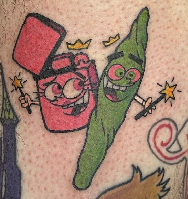 an image of two cartoon characters on the back of a man's leg with tattoos