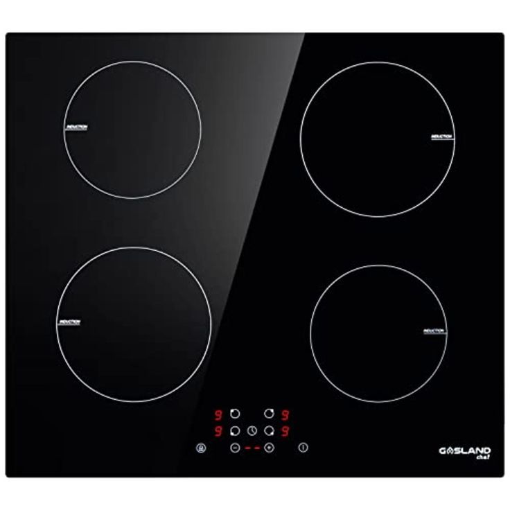 a black electric stove top with three burners