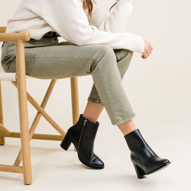 Boot up in style. This pair is perfect for both work and play, designed to elevate any outfit with sleek details and our slimmest heel yet. | Women's Lia Heeled Bootie . Almond Size 9.5 Classic Heeled Boots With Almond Toe And Padded Heel, Classic Almond Toe Heeled Boots With Padded Heel, Modern Fitted Boots With Low Heel, Modern Fitted Low Heel Boots, Medium Width Low Heel Boots For Work, Workwear Low Heel Boots, Sleek Fitted Low Heel Boots, Pointed Toe Heeled Boots With Heel Tab For Work, Chic Ankle-high Heeled Boots With Contrasting Heel