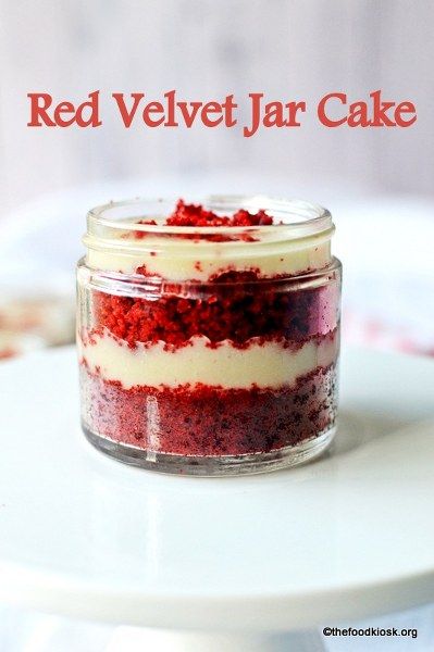 a red velvet jar cake sitting on top of a white plate with the words red velvet jar cake above it