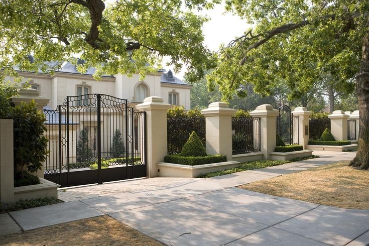 a gated in area with trees and bushes