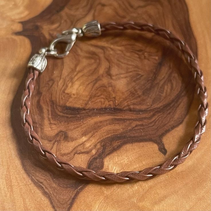 This list is for one bracelet. It was made using faux leather cord. This bracelet closes to around 6.5" inches Adjustable Brown Bracelets As Fashion Accessory, Everyday Braided Leather Bracelets, Classic Brown Bangle Bracelets, Adjustable Brown Bracelet, Adjustable Brown Bracelets For Everyday Use, Adjustable Brown Braided Bracelet For Everyday Use, Adjustable Everyday Jewelry Bracelet, Classic Adjustable Leather Bracelet For Everyday, Classic Adjustable Leather Bracelet