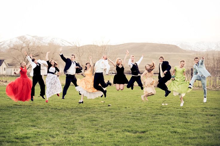 a group of people jumping in the air