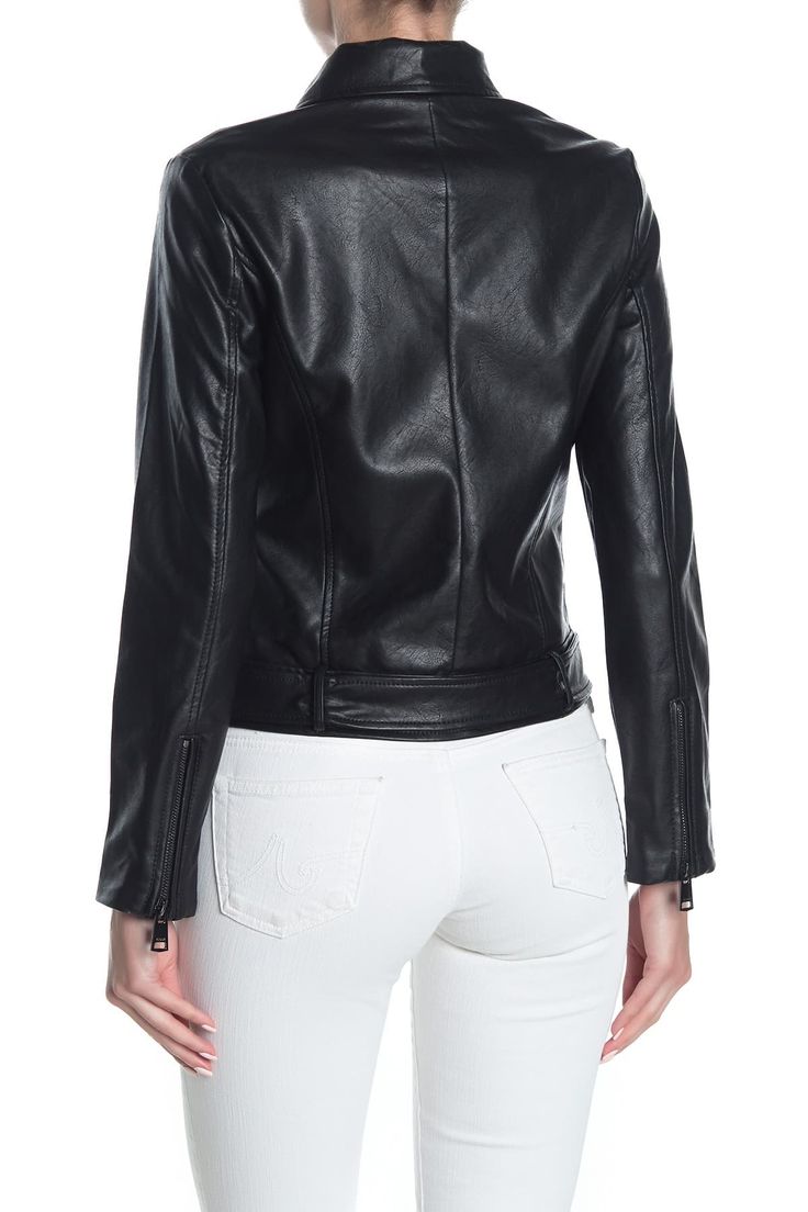 Zip and buckle details elevate this faux leather moto jacket with edgy style. Fit: this style fits true to size. Notch collar. Long sleeves with zip cuffs. Front zip closure. Adjustable belted hem. Faux leather construction. Lined. Approx. 23" length (size S). Imported Trendy Faux Leather Jacket With Zipper Closure, Trendy Faux Leather Jacket With Zip Fly, Sleek Faux Leather Jacket, Spring Leather Fitted Biker Jacket, Leather Jacket With Zipper Closure For Fall, Chic Fitted Faux Leather Biker Jacket, Leather Jacket With Zipper For Fall, Fitted Moto Leather Jacket With Zipper Closure, Chic Faux Leather Jacket With Zipper