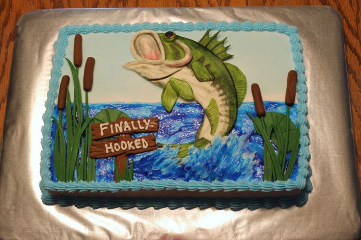 a birthday cake with a large fish on it