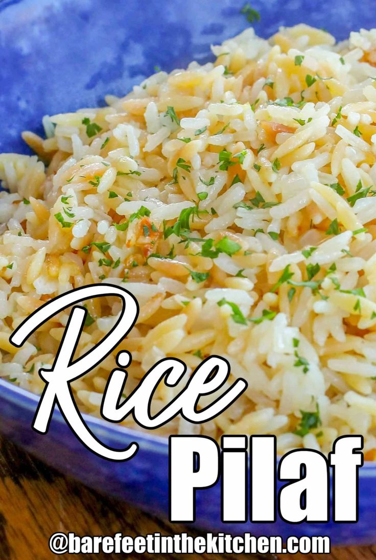 rice pilaf with parsley in a blue bowl on top of a wooden table