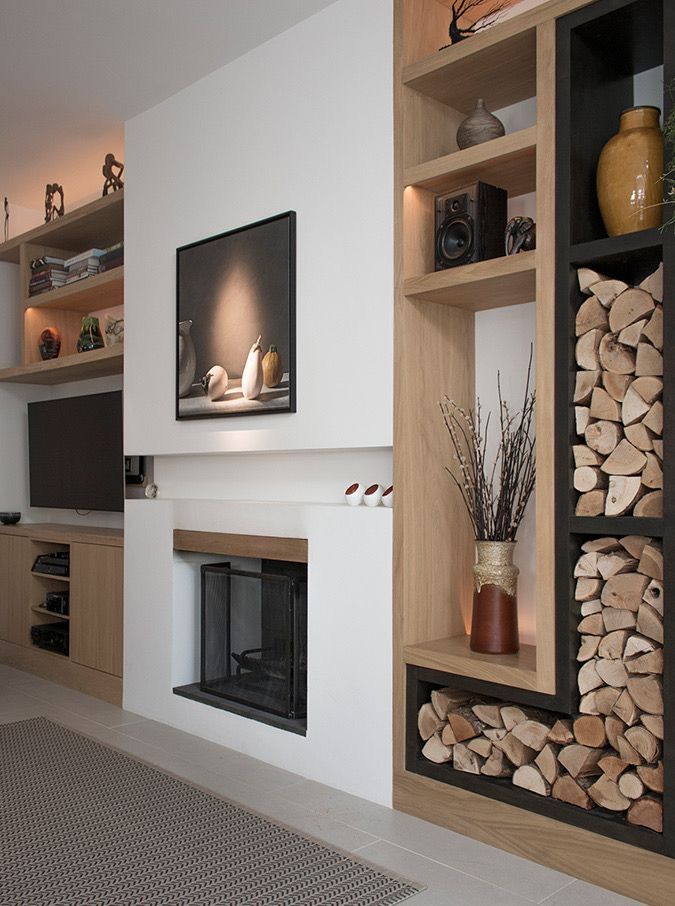 a living room filled with lots of furniture and firewood stacked on top of each other