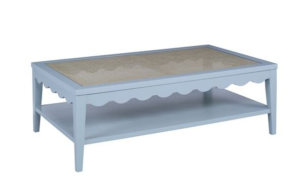 a blue coffee table with a shelf underneath it