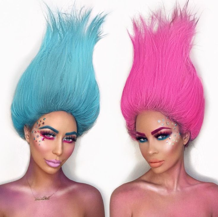 two mannequins with different colored hair and makeup