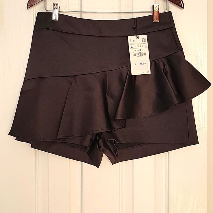 95% Polyester 5% Elastane Black Skort (shorts With Skirt Shape), Chic High-waisted Skort With Pockets, Elegant High-waist Skort With Built-in Shorts, High Waist Skirt With Built-in Shorts For Night Out, High-waist Skirt With Built-in Shorts For Night Out, Chic High-waisted Skort, Chic Party Skort (shorts Skirt), Chic Party Skort With Pockets, Elegant Black Skort